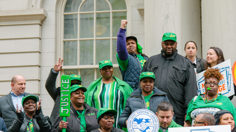 Unions rallying in support of the legislation on the steps of City Hall.
